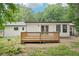 A cozy wooden back deck complements the house's design and enhances the outdoor experience at 2450 Elkhorn Dr, Decatur, GA 30034