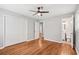 Bedroom with hardwood floors, ceiling fan, closet and en-suite bathroom at 2450 Elkhorn Dr, Decatur, GA 30034