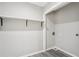 Spacious closet featuring neutral paint, modern trim, and wood-look flooring at 2450 Elkhorn Dr, Decatur, GA 30034
