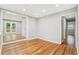 Bright dining area with hardwood floors, view to the deck and backyard at 2450 Elkhorn Dr, Decatur, GA 30034