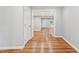 Hallway featuring hardwood flooring and neutral paint color at 2450 Elkhorn Dr, Decatur, GA 30034