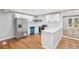 Modern kitchen featuring white cabinets, subway tile backsplash, and stainless steel appliances at 2450 Elkhorn Dr, Decatur, GA 30034