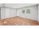 Spacious living room with hardwood floors, a light gray walls, and a bright natural light at 2450 Elkhorn Dr, Decatur, GA 30034