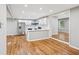 Open concept living room featuring hardwood floors and plenty of natural light at 2450 Elkhorn Dr, Decatur, GA 30034