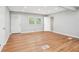 Bright living room featuring hardwood floors, recessed lighting, and multiple windows at 2450 Elkhorn Dr, Decatur, GA 30034