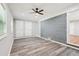 Inviting living room with stylish painted brick accent wall and two closets at 2450 Elkhorn Dr, Decatur, GA 30034