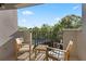 Balcony with outdoor seating offering views of the pool and lush landscape at 970 Sidney Marcus Ne Blvd # 2408, Atlanta, GA 30324