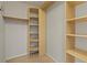 Organized walk-in closet featuring adjustable shelving for efficient storage at 970 Sidney Marcus Ne Blvd # 2408, Atlanta, GA 30324