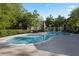 Inviting community pool surrounded by lush trees, offering a refreshing retreat for residents at 970 Sidney Marcus Ne Blvd # 2408, Atlanta, GA 30324