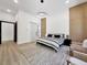 Bedroom featuring stylish furniture, wood panel, a barn door and an outside view at 191 Darwish Dr, Mcdonough, GA 30252