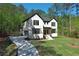 Beautiful exterior of a modern two-story home, manicured lawn, with a concrete driveway at 191 Darwish Dr, Mcdonough, GA 30252