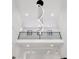Modern two story foyer with large chandelier, black railing and large windows at 191 Darwish Dr, Mcdonough, GA 30252
