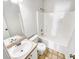 A functional bathroom with a combined shower and tub, toilet, and vanity at 45 Carroll St, Temple, GA 30179