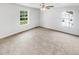Spacious bedroom with neutral carpet, bright windows, and ample natural light at 45 Carroll St, Temple, GA 30179