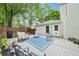 Enjoy outdoor living on the spacious back deck with comfortable seating and a grill area at 725 Crab Orchard Ct, Roswell, GA 30076