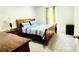 Inviting bedroom featuring a comfortable bed, classic furniture, and warm natural light at 11 Plymouth Ct, Kingston, GA 30145