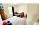 Bedroom featuring a wooden toddler bed and neutral carpet; a blank canvas for imagination and play at 11 Plymouth Ct, Kingston, GA 30145