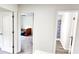Hallway view of two separate rooms, one being a bedroom, and the other a bathroom at 11 Plymouth Ct, Kingston, GA 30145
