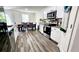 Well-lit kitchen featuring modern appliances, granite countertops, and an adjacent dining area at 11 Plymouth Ct, Kingston, GA 30145