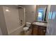 Bathroom featuring shower and vanity with sink offering a functional design at 1395 Kala Dr, Lithonia, GA 30058