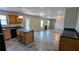 Open-concept kitchen with a center island, wood cabinets, and modern appliances, ideal for entertaining at 1395 Kala Dr, Lithonia, GA 30058