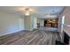 Open floor plan showcasing the living room with fireplace and kitchen in the background at 1395 Kala Dr, Lithonia, GA 30058