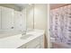 Bathroom with a vanity and a shower and bathtub combo at 4802 Moon Chase Dr, Buford, GA 30519