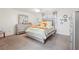 This is a cozy bedroom with a dresser, mirror, bed, and natural light at 4802 Moon Chase Dr, Buford, GA 30519