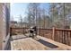 Wood deck with a grill, perfect for outdoor cooking and entertaining at 4802 Moon Chase Dr, Buford, GA 30519
