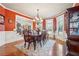 Formal dining room with a large table, chairs, and decorative chandelier at 4802 Moon Chase Dr, Buford, GA 30519
