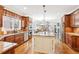 Spacious kitchen that opens to the living room featuring stainless appliances and a large kitchen island at 4802 Moon Chase Dr, Buford, GA 30519