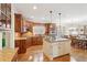 Well-equipped kitchen with stainless steel appliances, granite countertops, and a center island at 4802 Moon Chase Dr, Buford, GA 30519