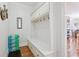 Mudroom with built in cubbies and storage bench at 4802 Moon Chase Dr, Buford, GA 30519