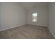 Bedroom featuring window and plush carpeting at 490 Charleston Pl, Villa Rica, GA 30180