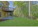 Lush backyard features well-maintained grass and a modern fence at 823 Valley Dr, Canton, GA 30114