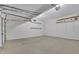 Clean and spacious garage with shelving and ample storage space at 823 Valley Dr, Canton, GA 30114