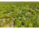 Expansive aerial view of the neighborhood surrounded by lush green trees at 1290 Campbellton Sw Rd, Atlanta, GA 30310