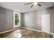 Bedroom with wood floors and a ceiling fan at 1290 Campbellton Sw Rd, Atlanta, GA 30310