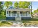 Charming single-story home with a welcoming front porch and landscaped walkway at 1290 Campbellton Sw Rd, Atlanta, GA 30310