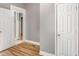 Hallway featuring fresh paint and wood floors at 1290 Campbellton Sw Rd, Atlanta, GA 30310