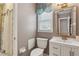 A full bathroom that offers a shower, toilet, and sink and vanity combo at 2724 Saddle Ridge Lake Dr, Marietta, GA 30062