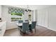 Bright dining area with a decorative window treatment and seating for four in a modern space at 2724 Saddle Ridge Lake Dr, Marietta, GA 30062