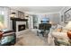 Cozy living room with a fireplace, comfortable seating, and ample space for relaxation and entertainment at 2724 Saddle Ridge Lake Dr, Marietta, GA 30062