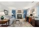 Inviting living room featuring a gas fireplace, custom built-ins, and a comfortable seating area at 2724 Saddle Ridge Lake Dr, Marietta, GA 30062