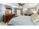 Serene main bedroom with a large bed, wooden furniture, and an ensuite bathroom at 2724 Saddle Ridge Lake Dr, Marietta, GA 30062