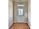 Welcoming entryway with wood floors at 702 Village Field Ct, Suwanee, GA 30024