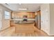 Beautiful kitchen featuring wood cabinets, stainless appliances, and an island with seating at 702 Village Field Ct, Suwanee, GA 30024
