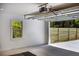 Spacious garage with an open door, showcasing ample storage and access to the property's exterior at 888 Old Tucker Rd, Stone Mountain, GA 30087