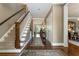 Elegant foyer features a staircase and entryway, welcoming guests at 1050 Signal Pointe, Alpharetta, GA 30005