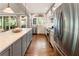 Well-equipped kitchen with stainless steel appliances, ample counter space, and hardwood flooring at 1050 Signal Pointe, Alpharetta, GA 30005